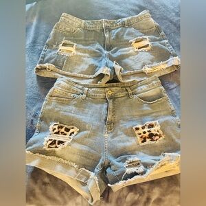 Bundle of two pair of  Distressed Denim Shorts Leopard and Camo Accents.